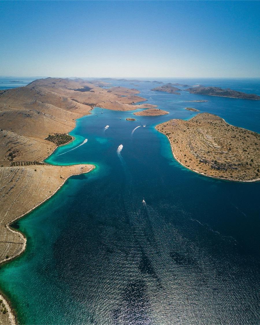 The bare islands of the Kornati archipelago in a blue sea