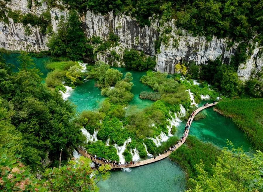 Wooden walkways winding over the turquoise lakes of Plitvice